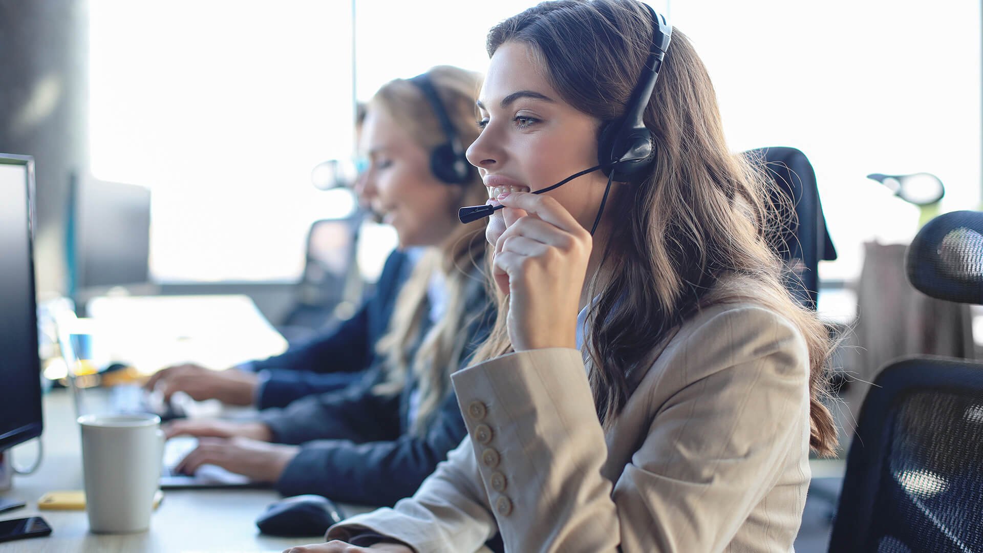 Support staff working at their desks